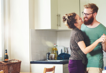 couple dancing in the kitchen