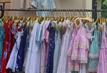 clothes on hangars at consignment sales