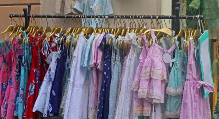 clothes on hangars at consignment sales