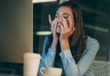 woman stressed with hands on face