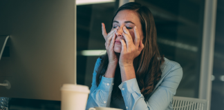 woman stressed with hands on face