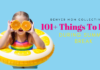 girl with swim tube holding orange rounds to her face
