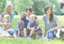 Meet the Denver Mom Collective Neighborhood Ambassadors Moms at the park smiling