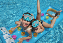 kids in pool on raft